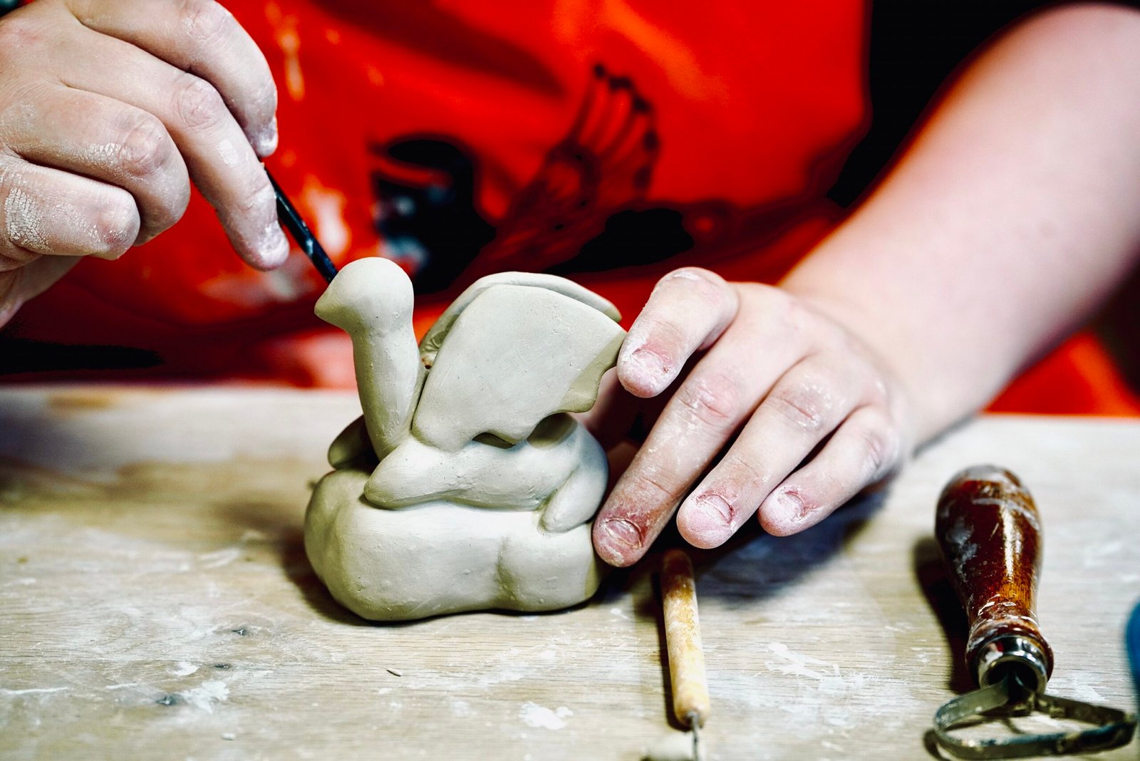Close-up view of colorful painted pottery pieces on display